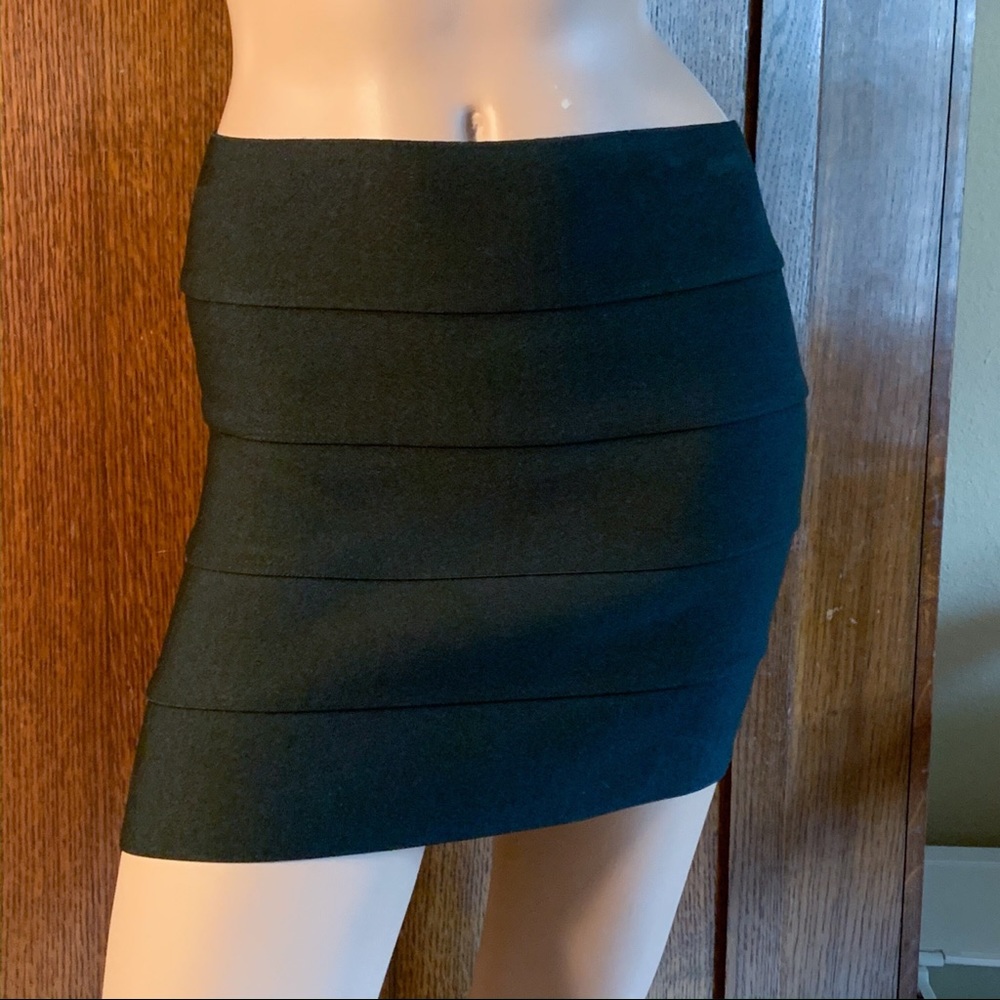 Black strap mini skirt